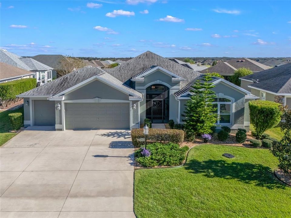 front exterior with expanded driveway