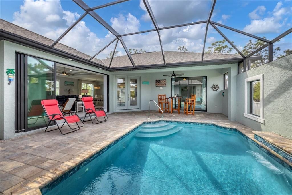 Stunning 14 foot long HEATED SALTWATER pool at 137 Wahoo Drive, Rotonda West FL 33947