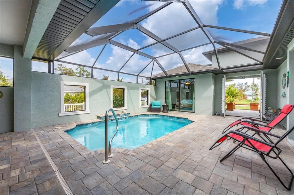 Casita and pool courtyard view from the main house at 137 Wahoo Drive, Rotonda West FL 33947