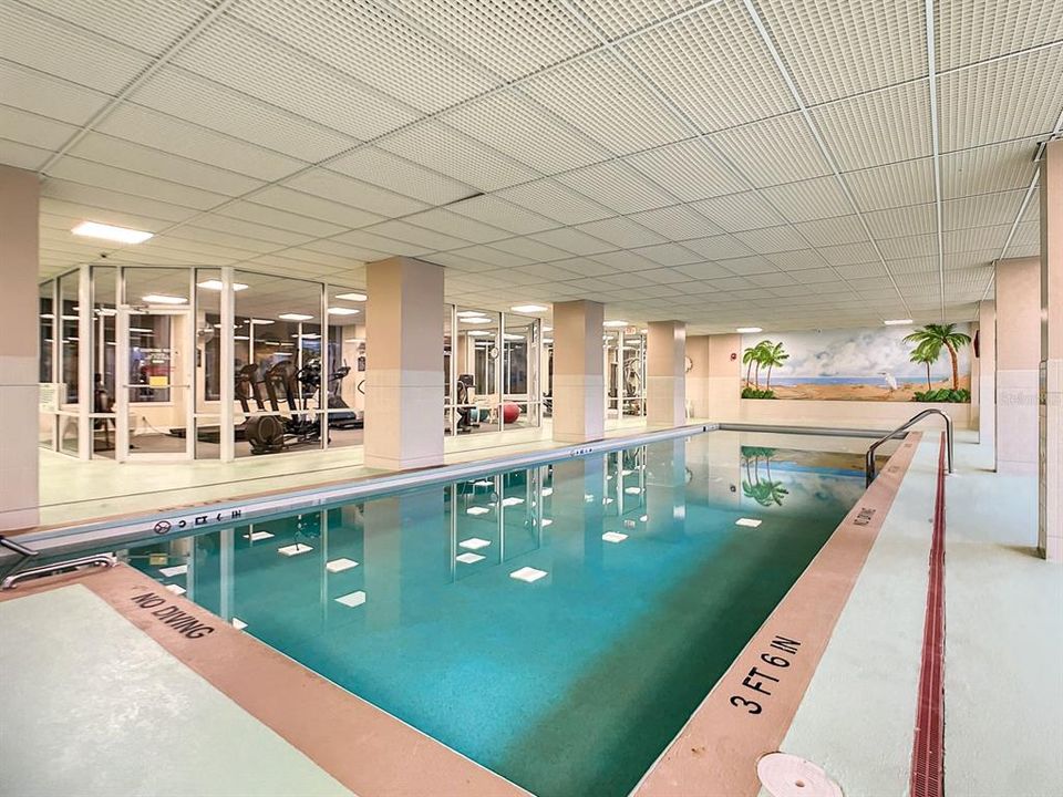 the indoor pool has lot of room around the pool