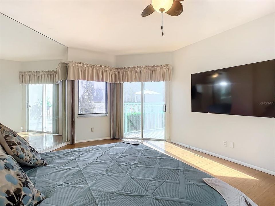 main bedroom looking to doorway to back porch