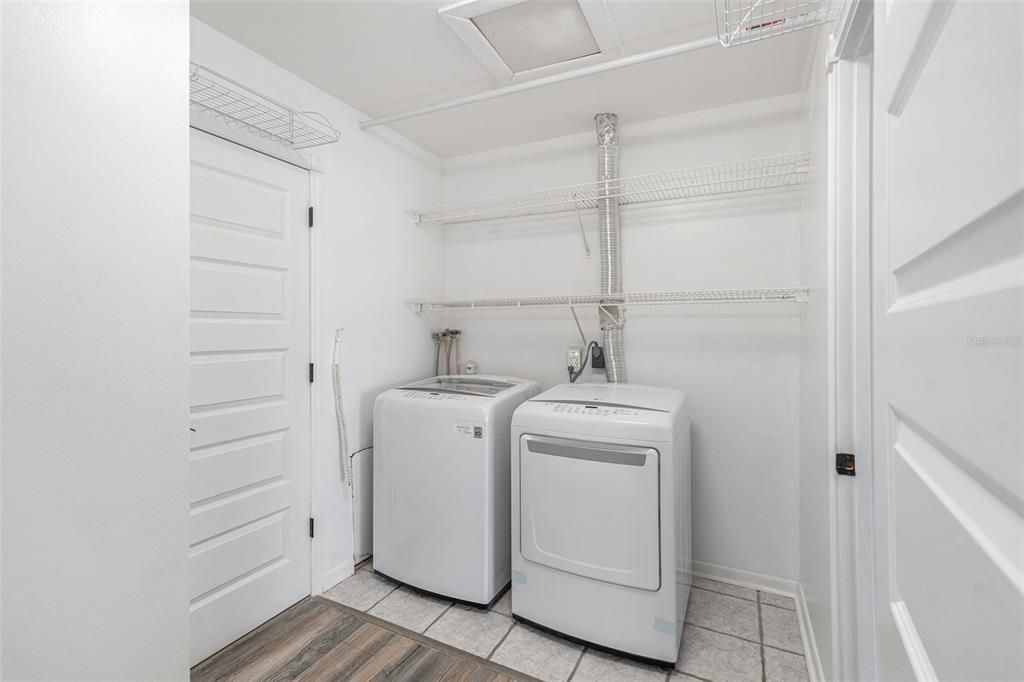 Laundry room & walk-in primary closet