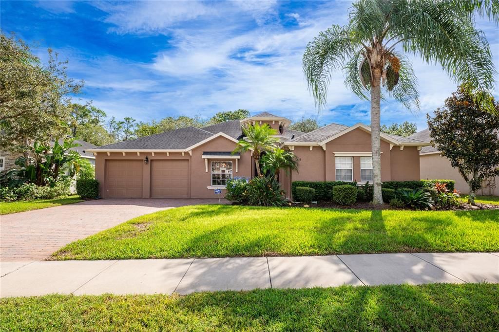 Tucked away on a quiet CUL-DE-SAC that dead ends at a POND, surrounded by CONSERVATION, you will find this 4-BEDROOM / 3-FULL BATH HOME with a 3-CAR SPLIT GARAGE, UPDATED ROOF & A/C, flexible layout with formal and family spaces and you are ZONED FOR TOP-RATED OVIEDO SCHOOLS!