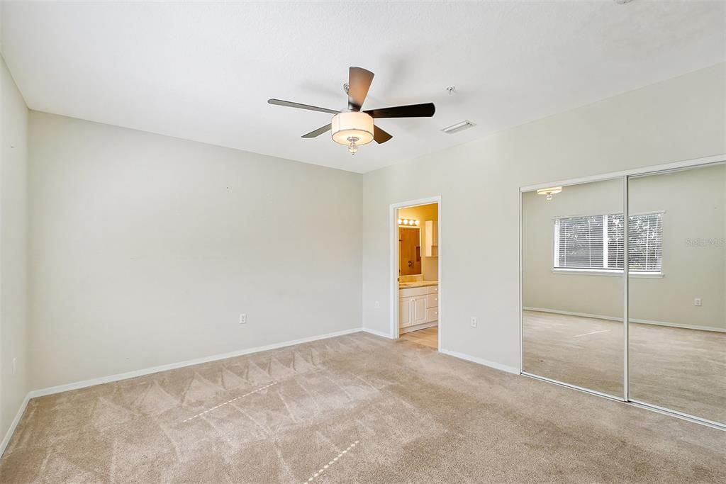 Primary Bedroom leads to Ensuite Bathroom.