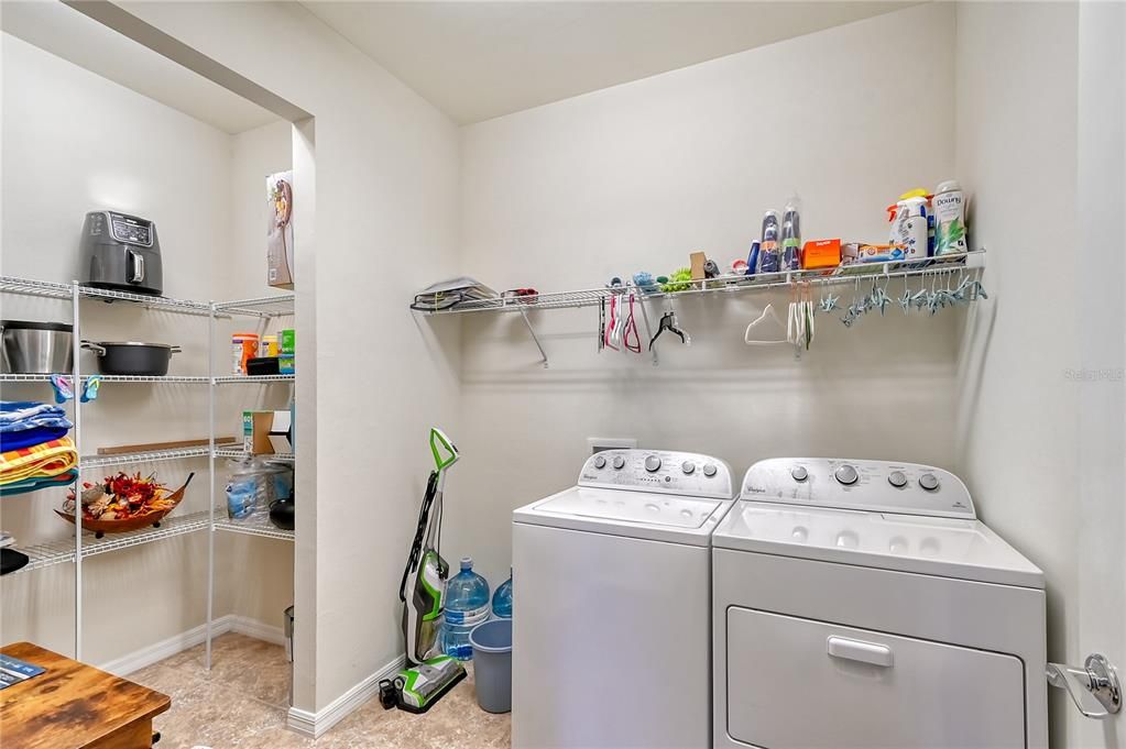 Laundry Room with Large Storage Closet