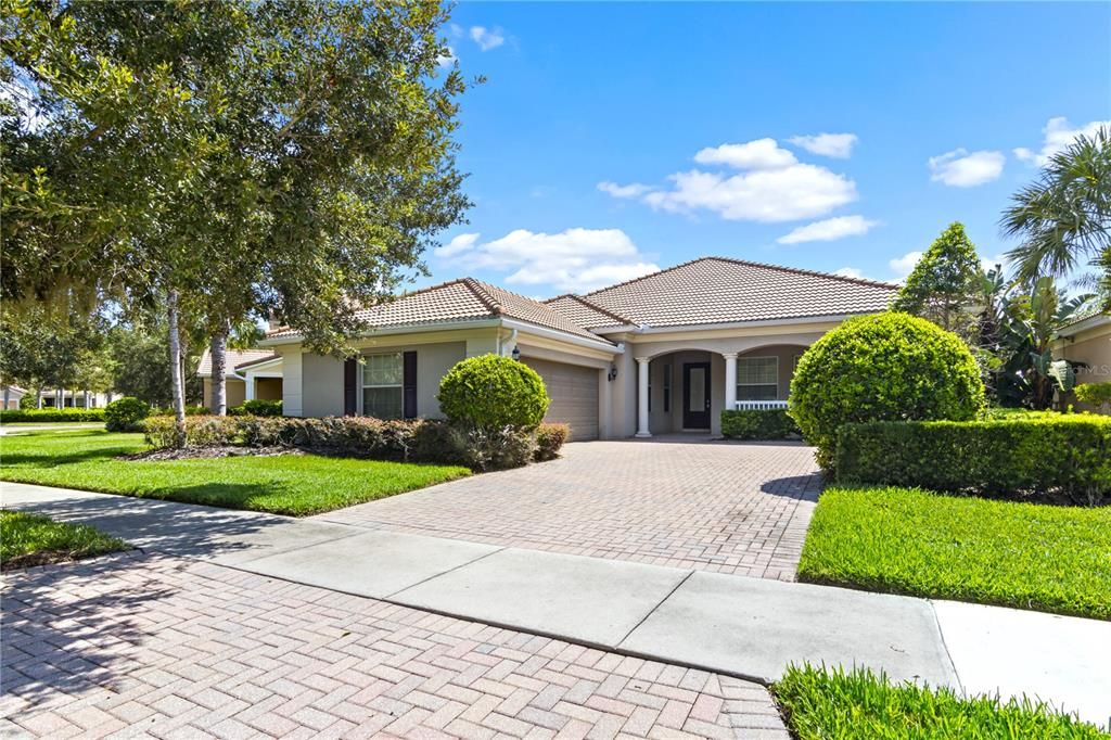 Front Exterior - Paved Stone Driveway