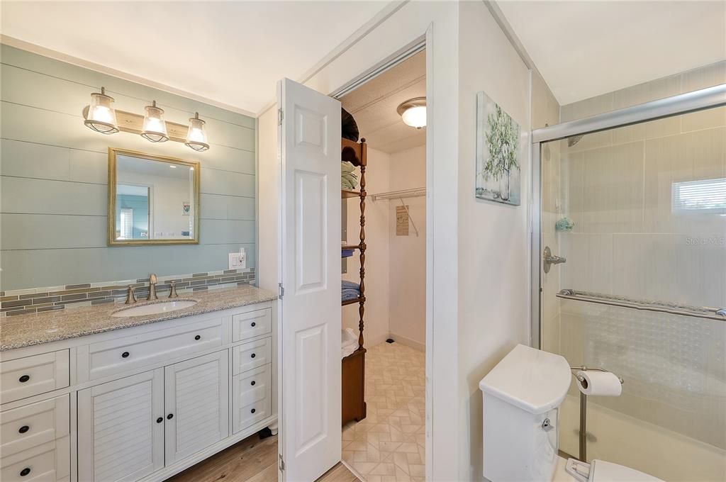 master bathroom with extensive closet