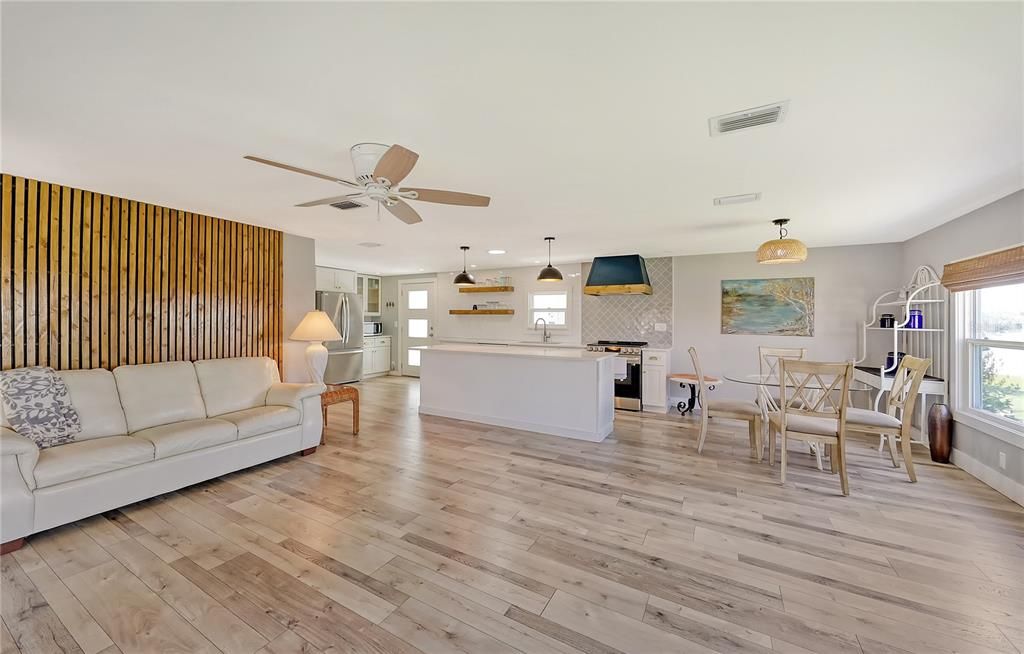 open floor plan: living room with the kitchen area