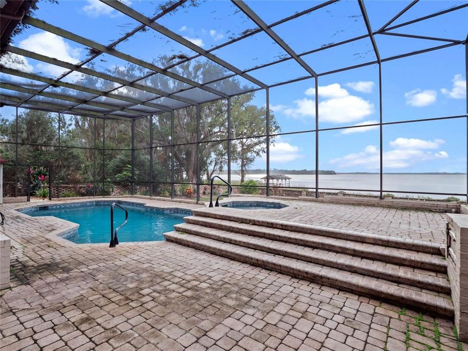 Pool with hot-tub and sunset views of the lake