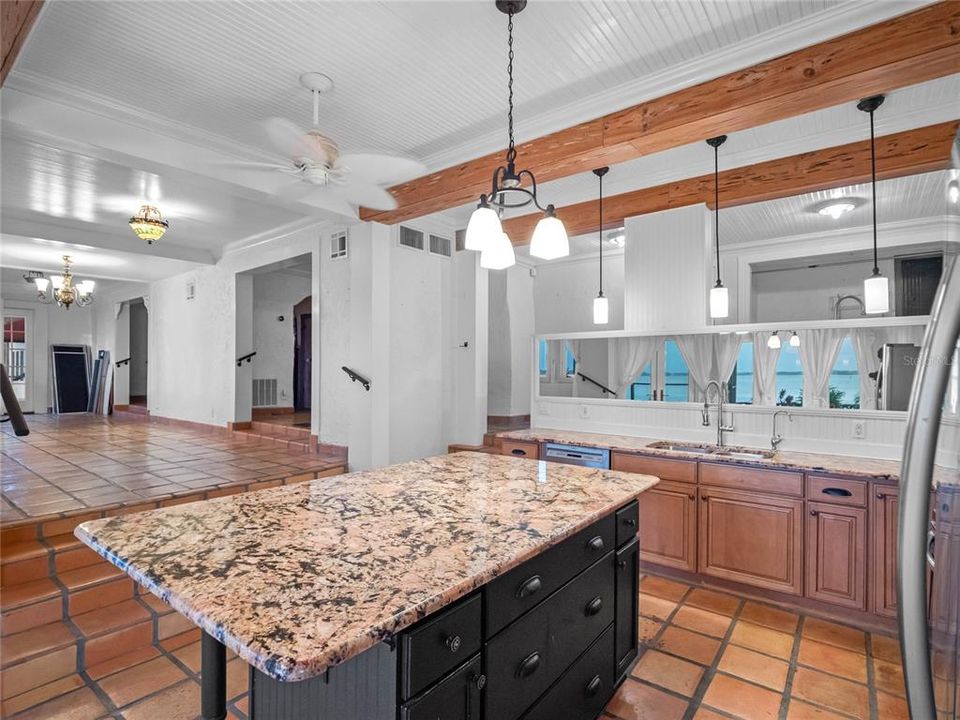 Kitchen with lake and pool views