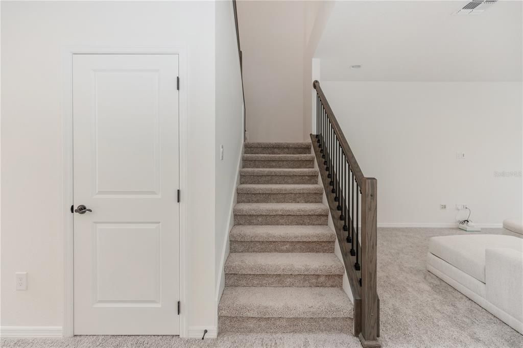 Stairwell with Storage Closet