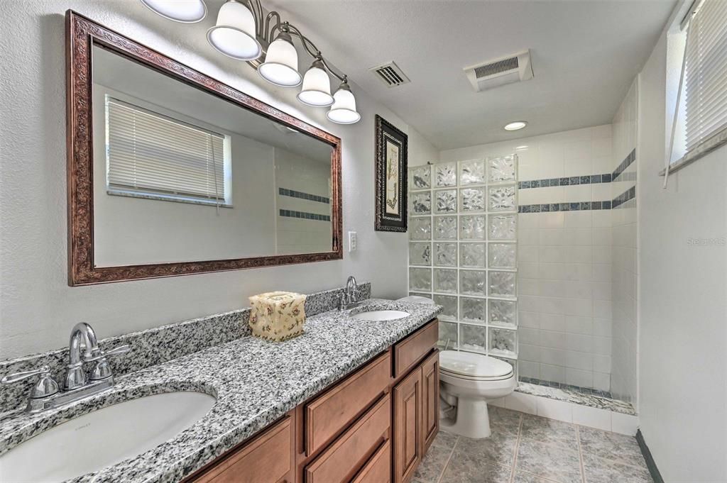 Primary bathroom w/granite double vanity