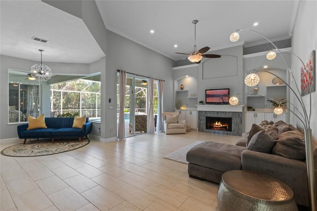 Family room and kitchen open to pool and outdoor area