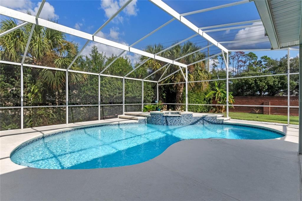 Heated pool with screen enclosure