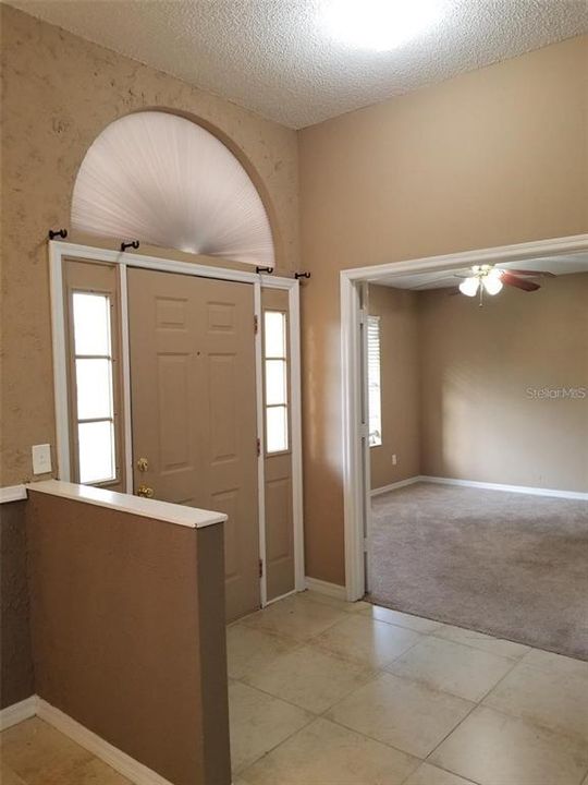 Foyer with views to Bonus Room