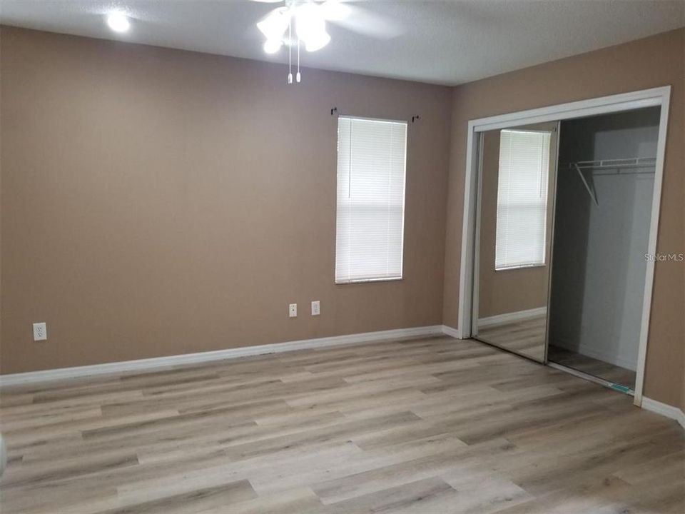 Primary bedroom - new flooring! And two BIG closets