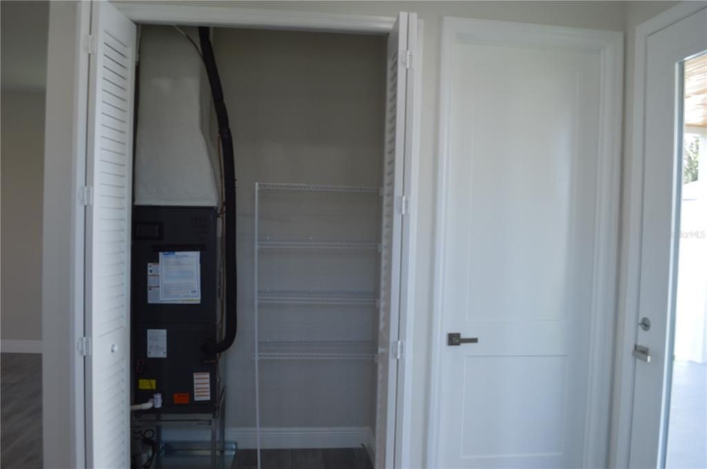 Downstairs closet and bathroom door