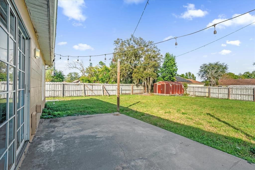 Patio with Fenced Backyard