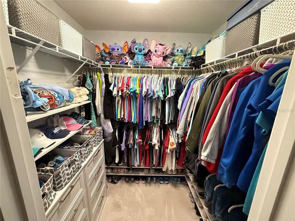 Primary closet with custom built ins