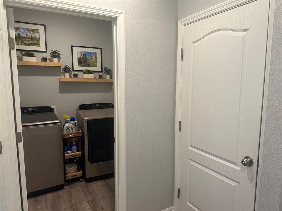 laundry room and door leading to garage