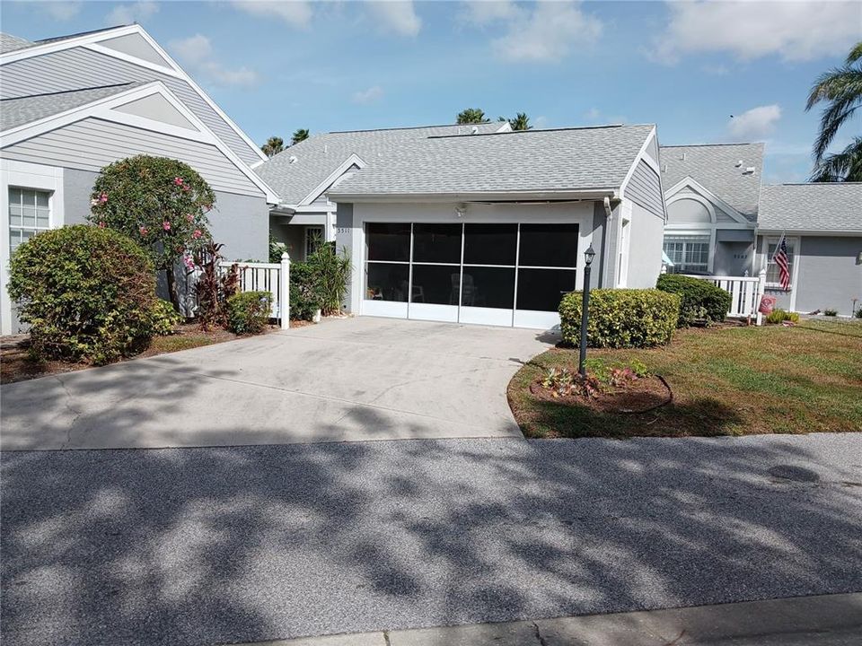 front of villa= 2 car garage with screen cover