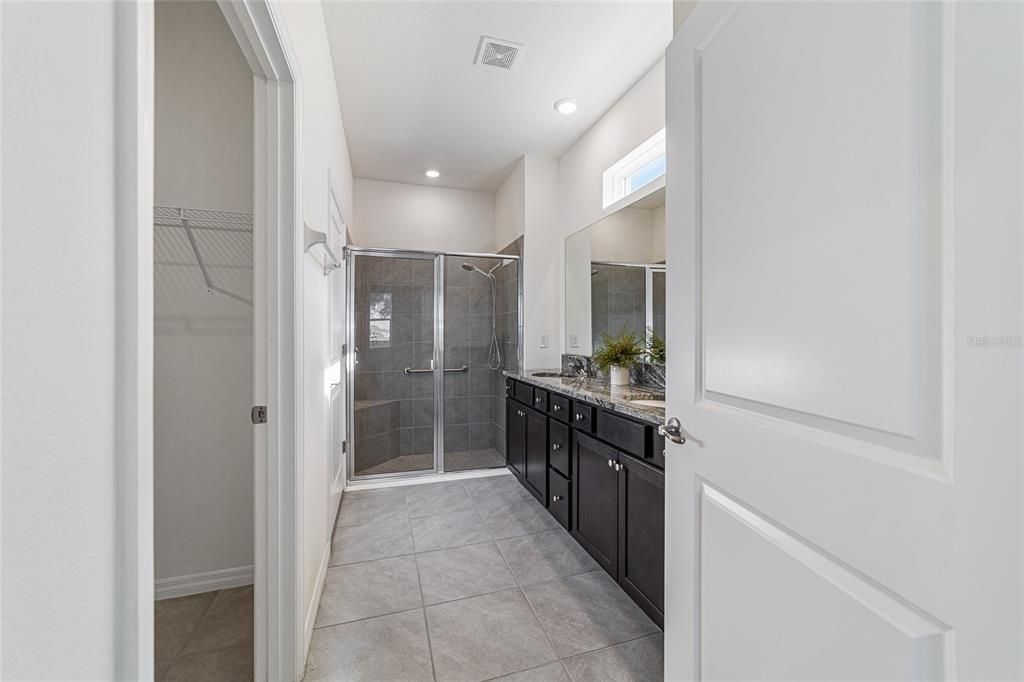 Primary Bathroom with water closet