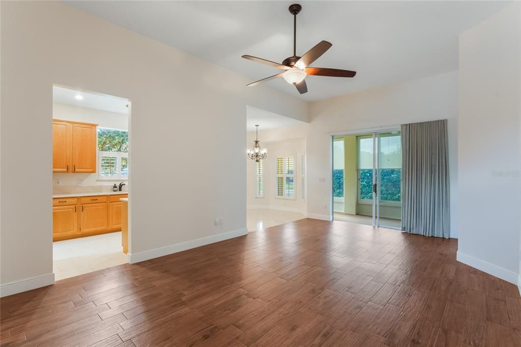 Living Room View to Dining and Kitchen