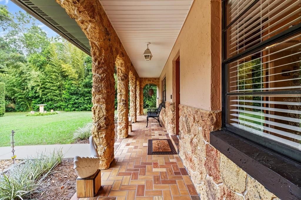 Covered Front Porch w/ Herringbone Patterned Tile Floor