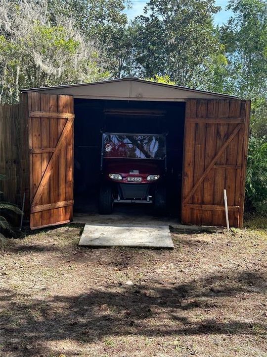 1 Shed in backyard. Golf cart community