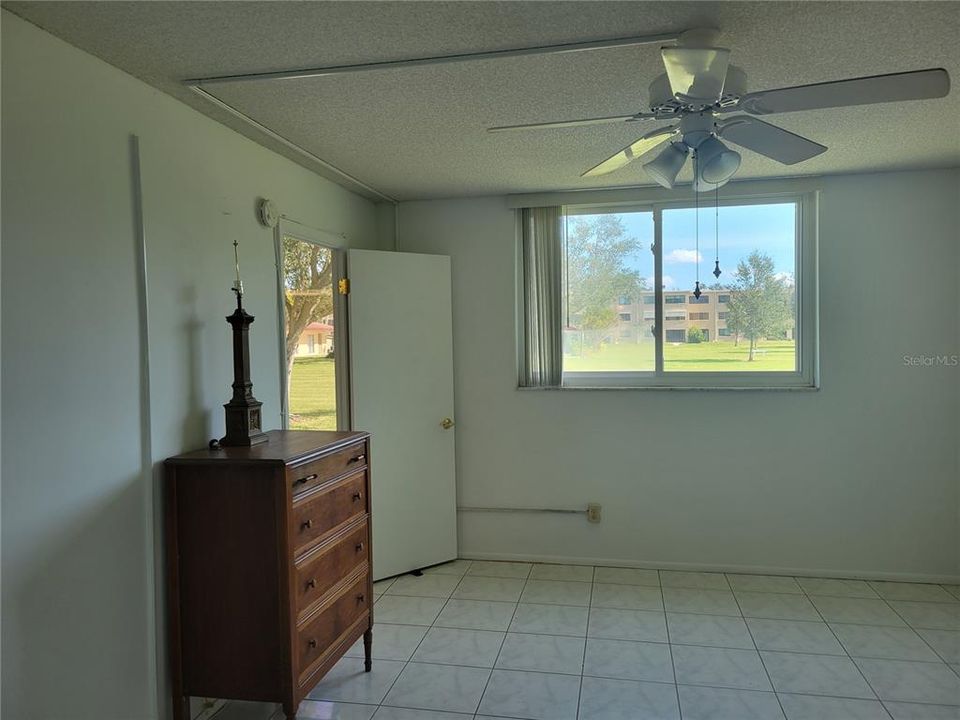 Primary bedroom overlooking courtyard