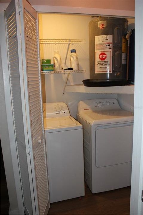 Inside utility area with washer and dryer