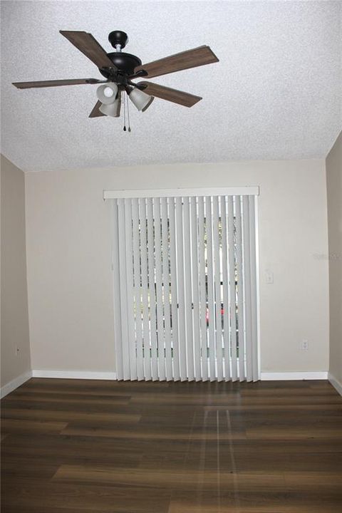 Primary bedroom with double French doors to patio