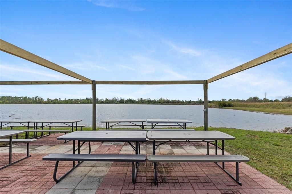 Picnic benches at the community lake