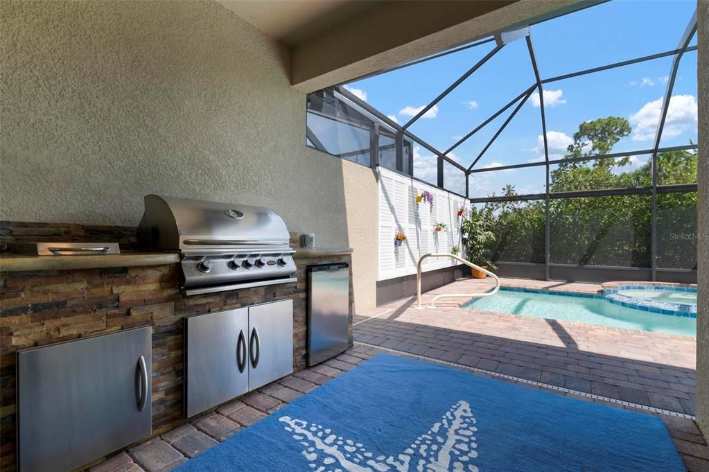 Lanai with outdoor kitchen