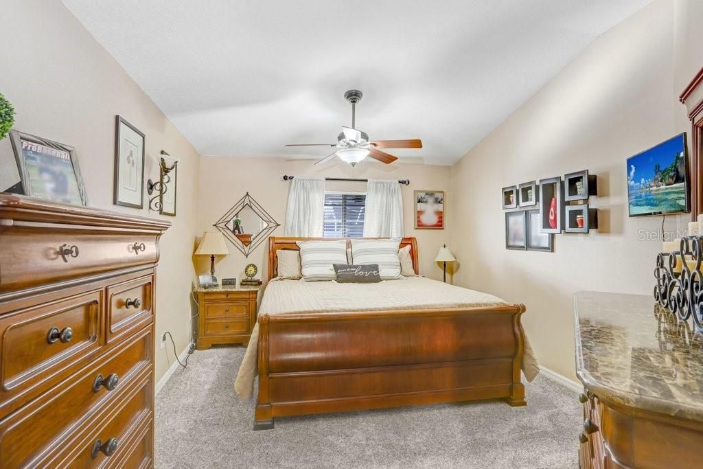 Master bedroom with King bed and view of the pool