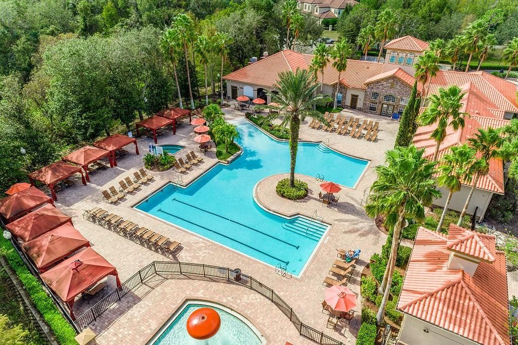 This 3BD/2BA second floor unit comes FULLY FURNISHED with a view of the amazing RESORT-STYLE POOL, a NEWER A/C & WATER HEATER, in-unit laundry and there is an elevator in the building making this home the perfect SHORT TERM RENTAL.