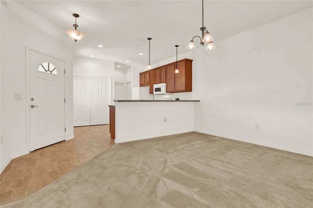 Foyer with tile flooring