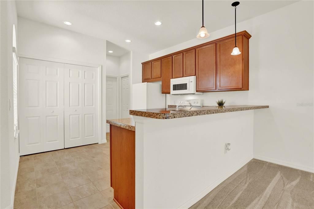 Large Breakfast Bar with Pendant Lighting