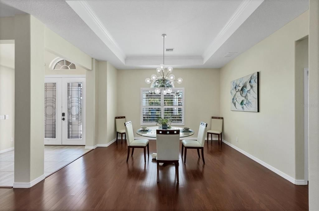 Elegant open dining room enables you to enjoy the space while dining.