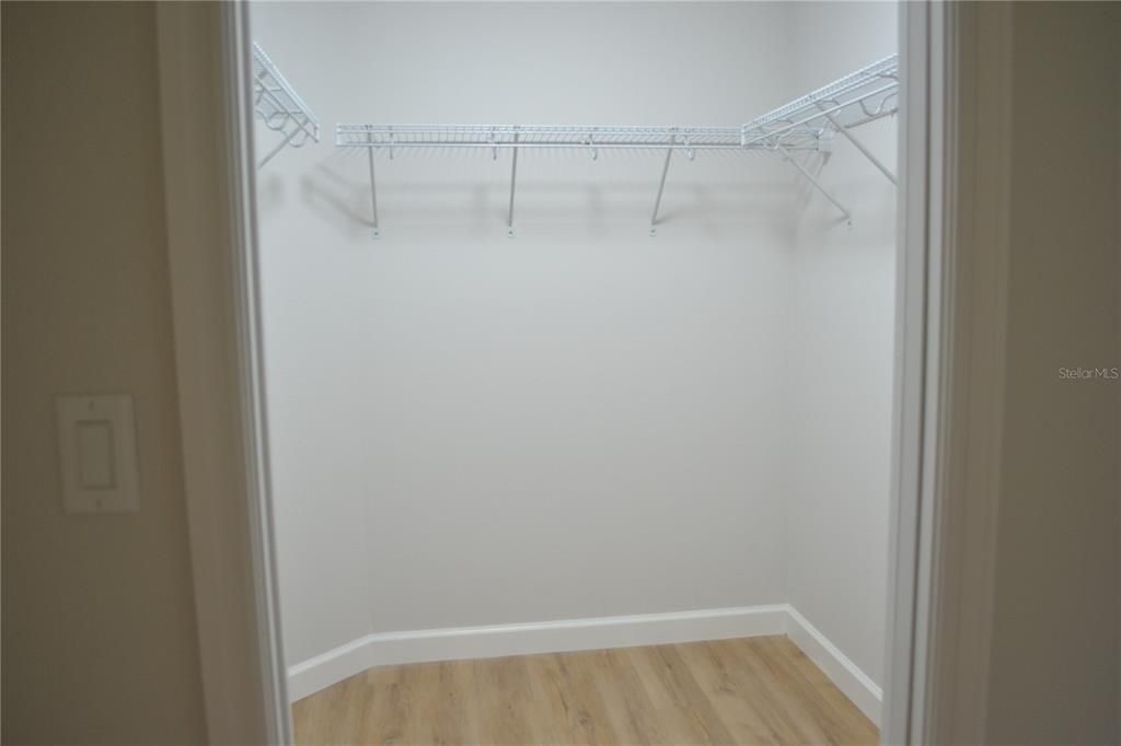 PRIMARY BEDROOM WALK-IN CLOSET