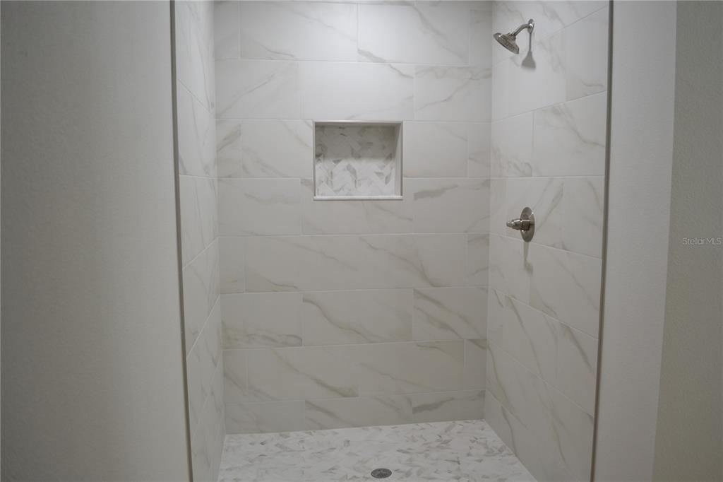 PRIMARY BATHROOM STEP IN SHOWER