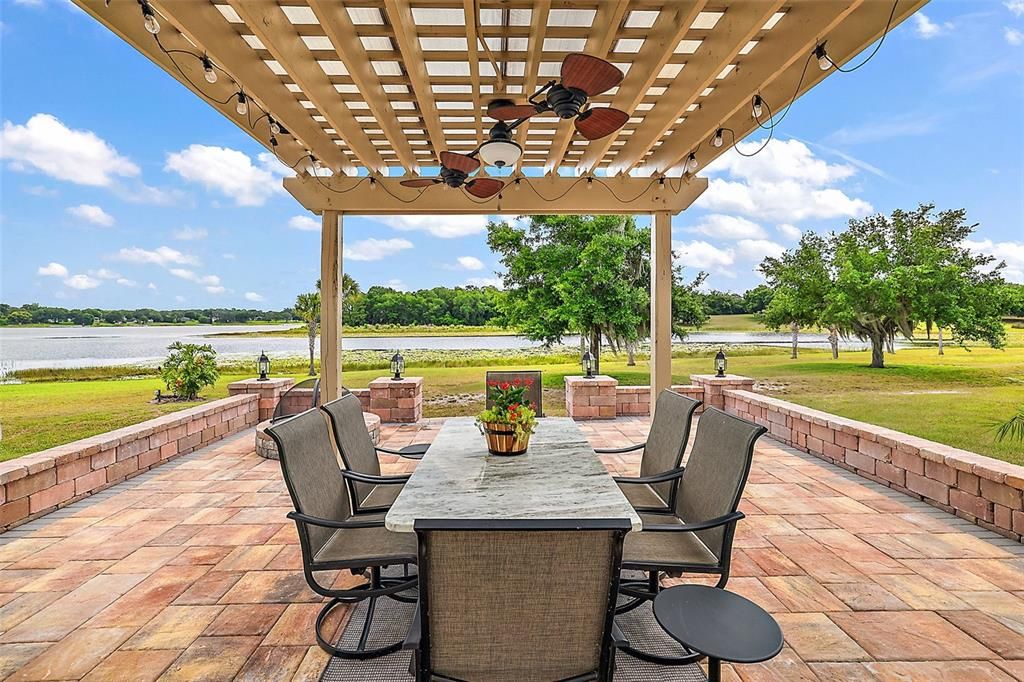 Entertain outdoors under the covered arbor.