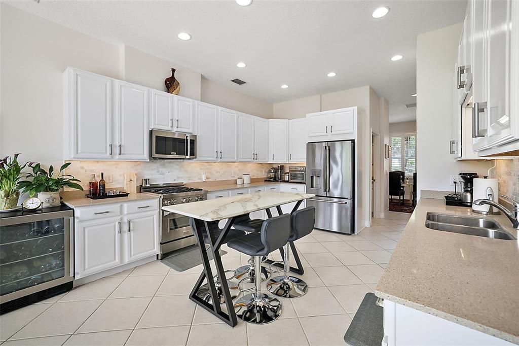 A very spacious kitchen with loads of cabinets.