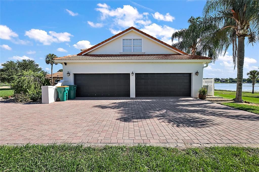 A 4 Car Garage provides ample space for autos and storage.