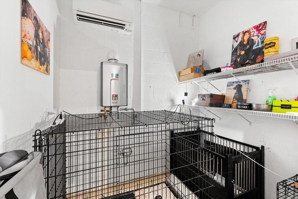 Dogs/Storage Area with room HVAC unit.