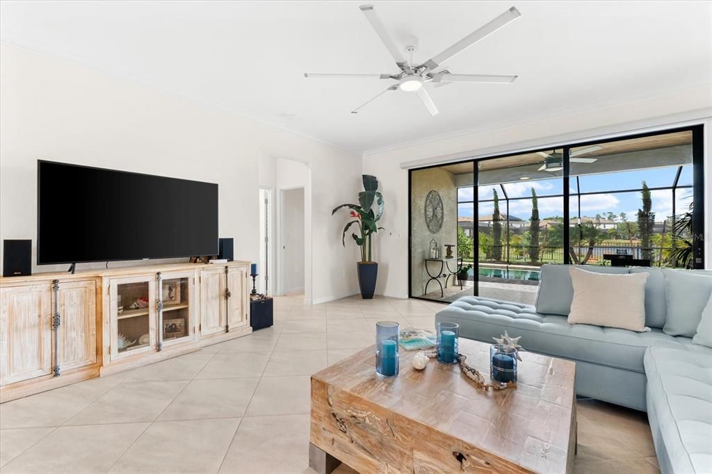 Living Room with view of outdoor living space and water.