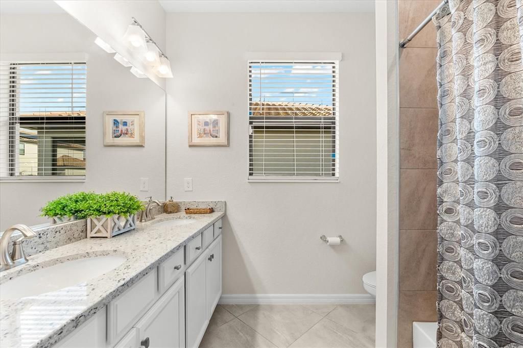 Bathroom 3.  Full tub and shower.