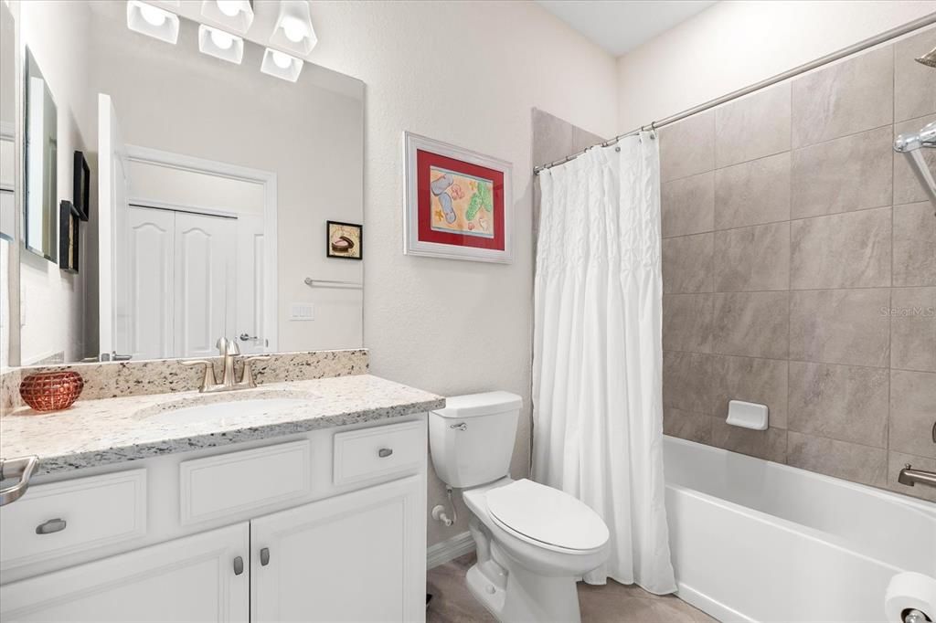 Bathroom 2 with shower/tub combo.