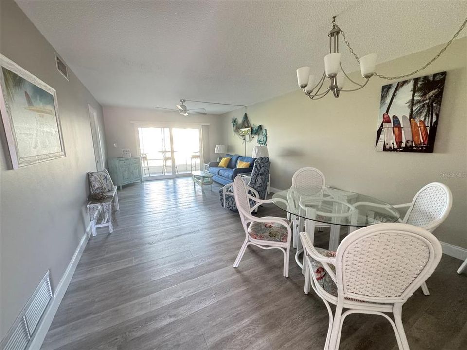 Living dining opens to balcony