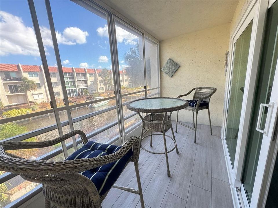 Screened balcony with water view